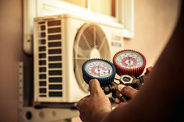 Professional Hvac technician working in Mathews, AL